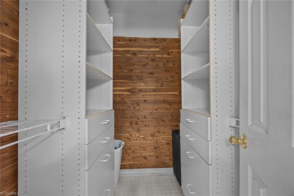 232 Holly Ridge Lane Mebane, NC 27302 - Photo 16 of 45 Cedar Lined Primary walk-in closet.