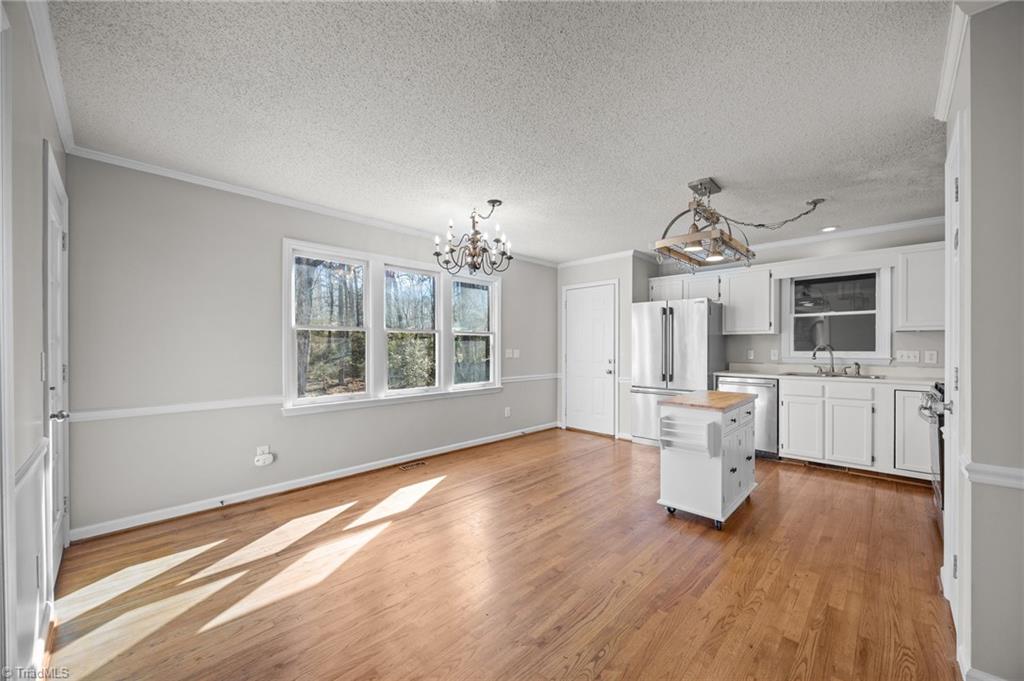 232 Holly Ridge Lane Mebane, NC 27302 - Photo 6 of 45 Bright Kitchen and Dining Room