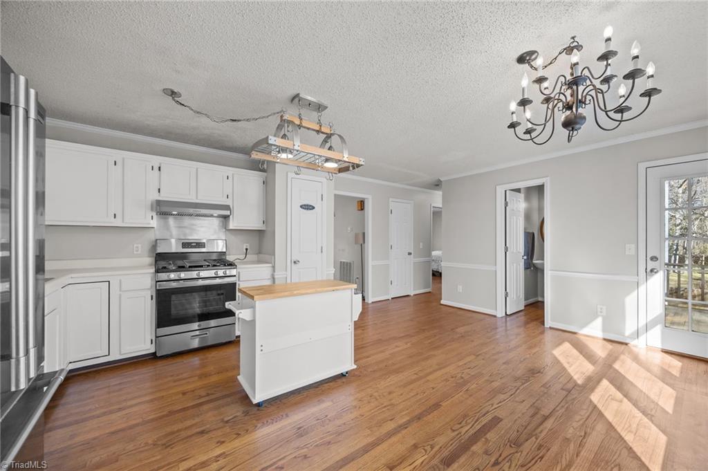 232 Holly Ridge Lane Mebane, NC 27302 - Photo 8 of 45 Rear Door to deck and backyard