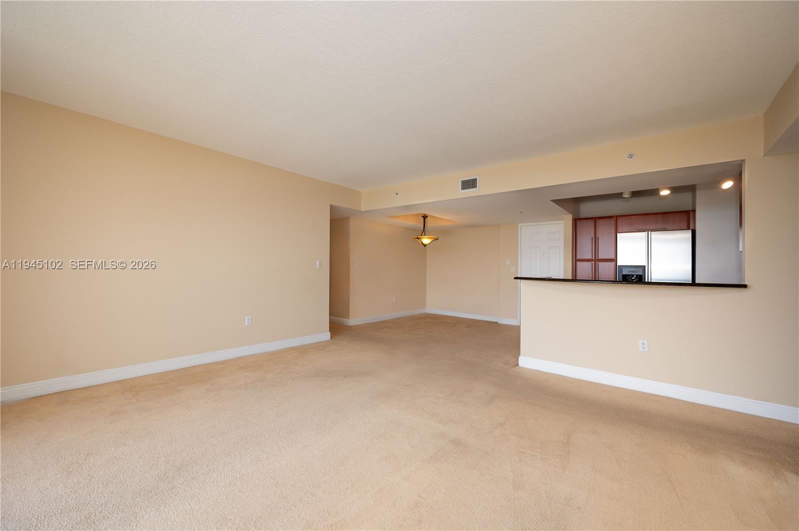 3232 Southwest 22nd Terrace, Unit 1504 Miami, FL 33145 - Photo 9 of 25 a view of an empty room with a window