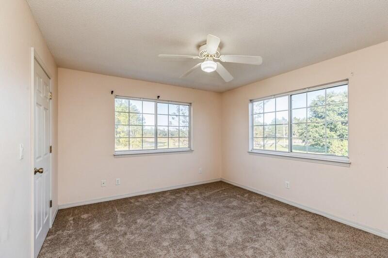 1510 Vinson Ray Road Baker, FL 32531 - Photo 36 of 60 a view of an empty room with a window