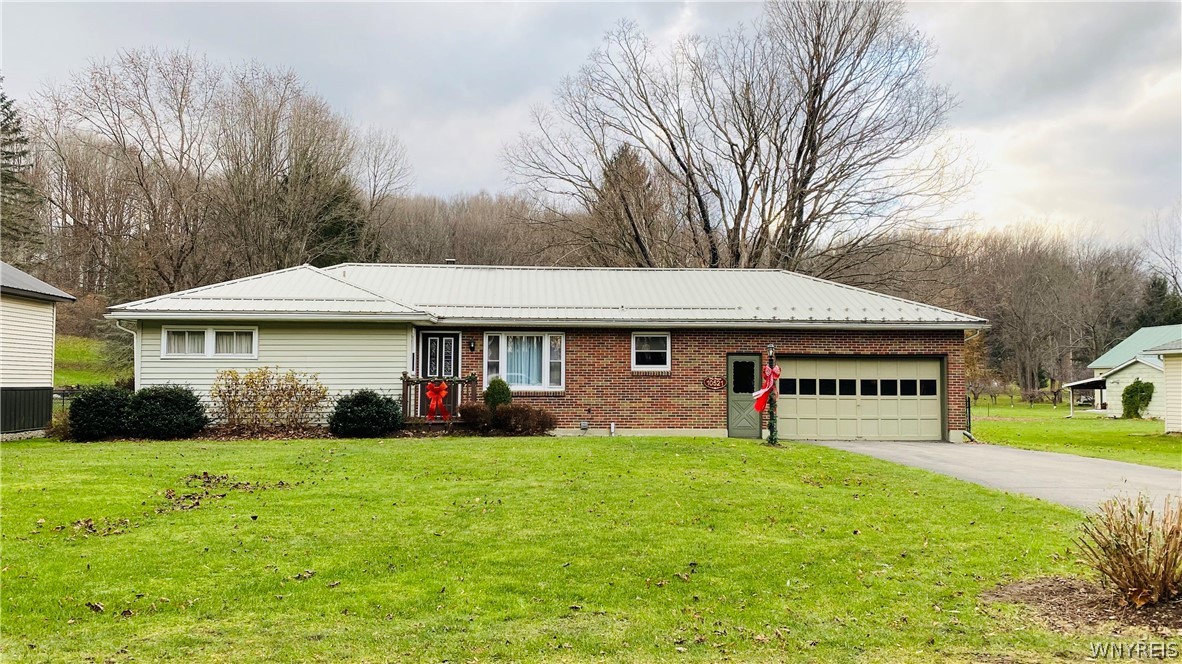 Totally updated on 1.5 acres.  Woods behind!