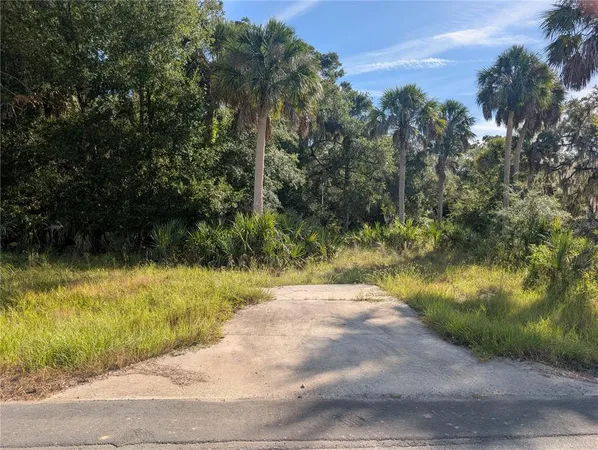 a view of a swimming pool and outdoor space