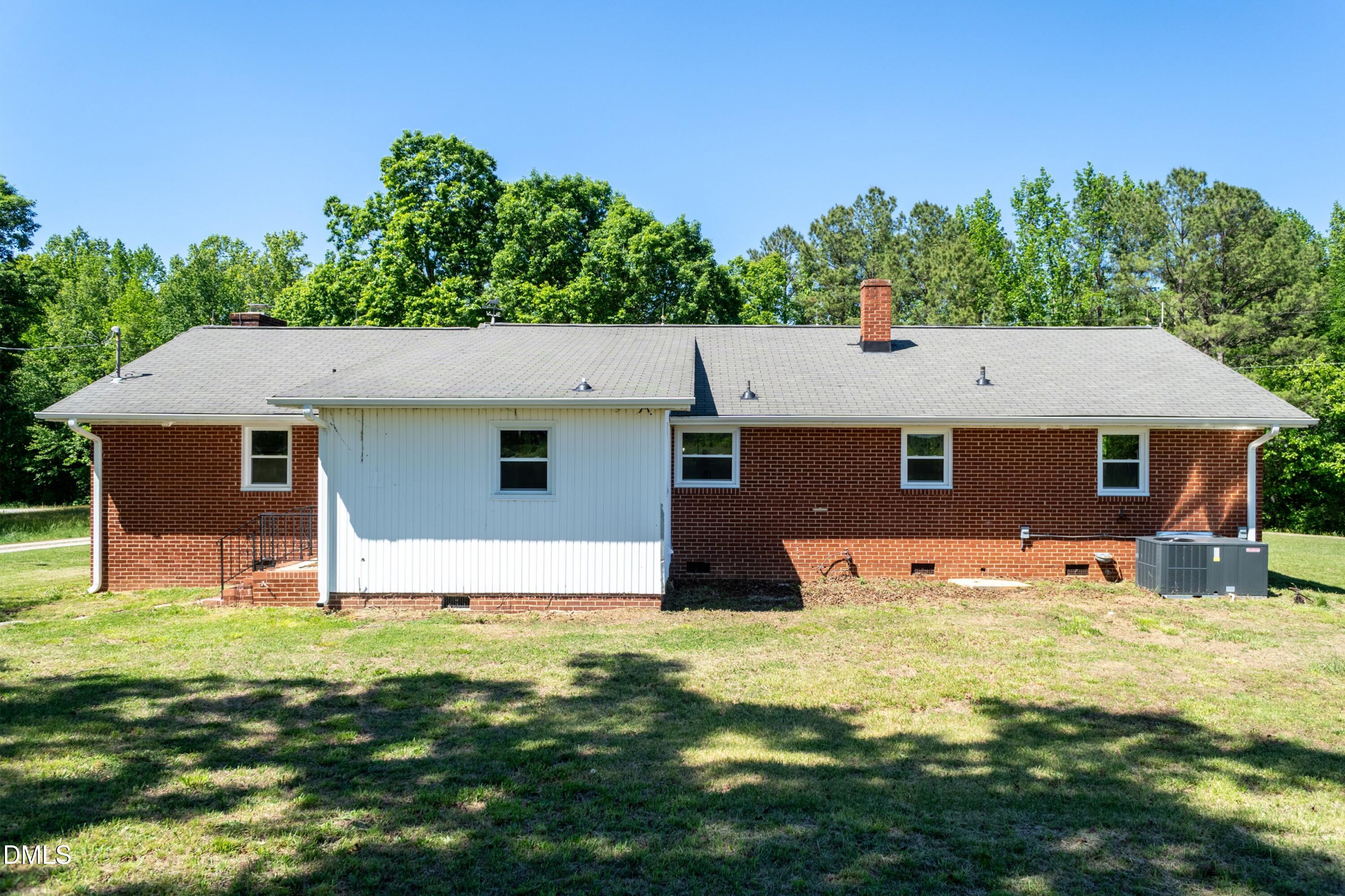 641 Rocky Ford Road Louisburg, NC 27549 - Photo 29 of 38 front view of a house with a yard
