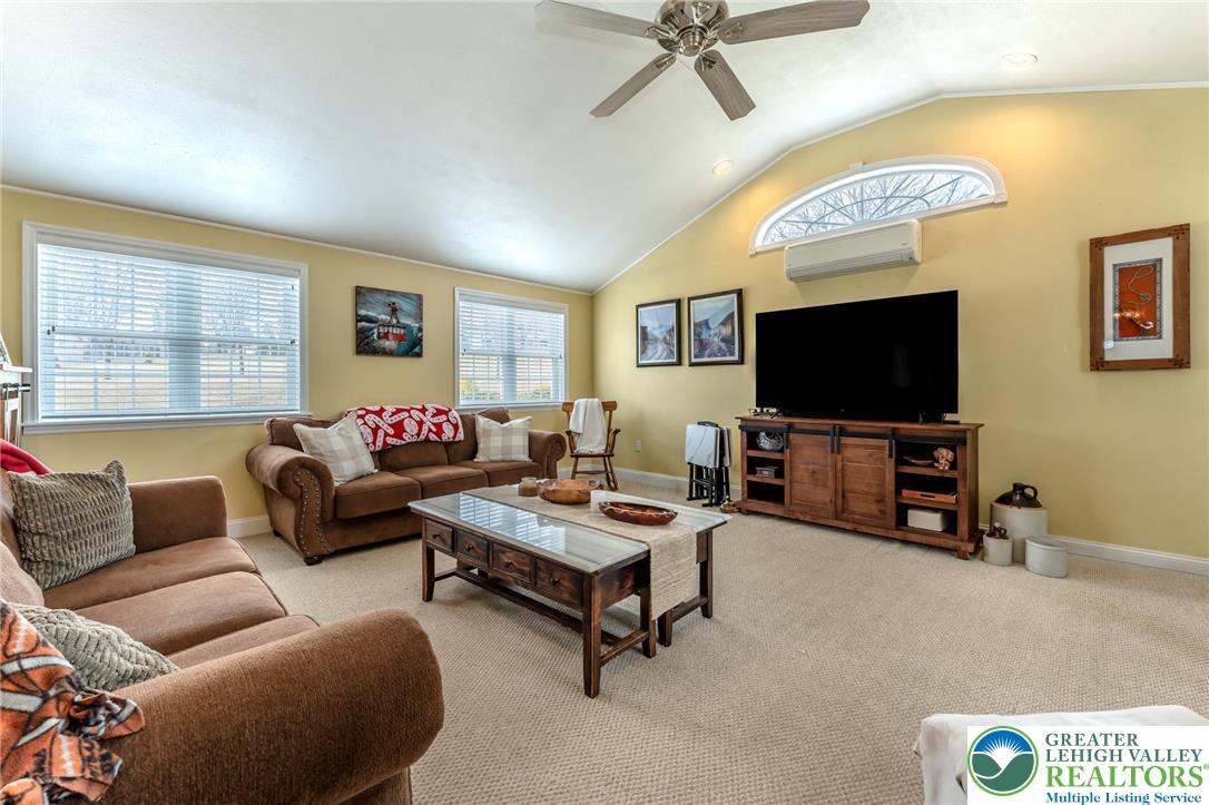 181 Springhouse Road Lehighton, PA 18235 - Photo 22 of 71 a living room with furniture and a flat screen tv