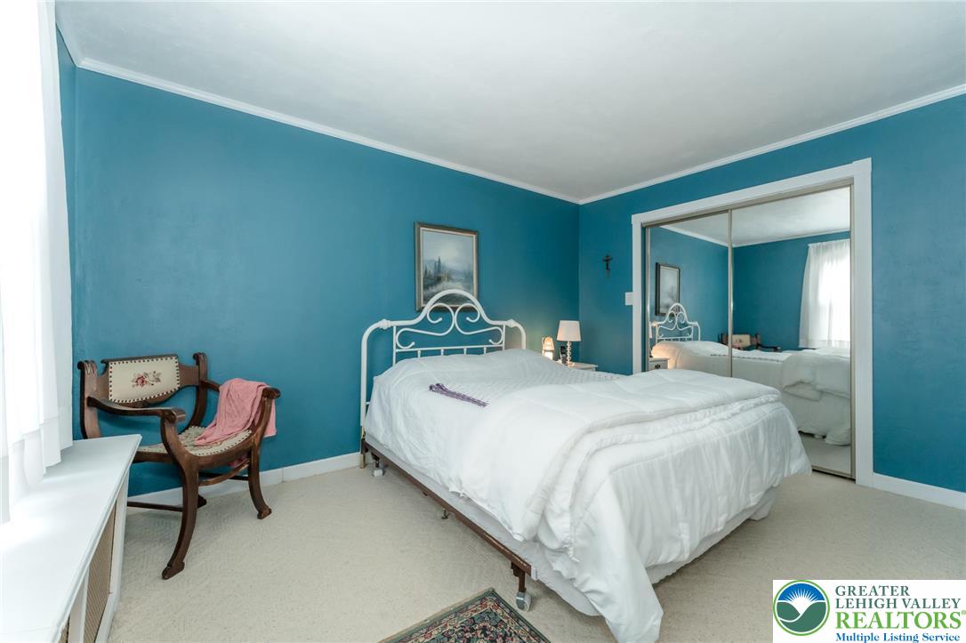181 Springhouse Road Lehighton, PA 18235 - Photo 46 of 71 a bedroom with a bed and chair