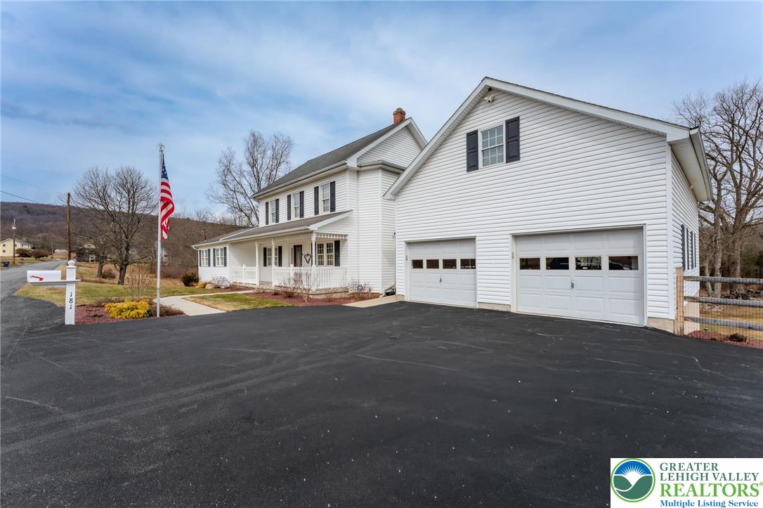 181 Springhouse Road Lehighton, PA 18235 - Photo 5 of 71 a front view of a house with a yard