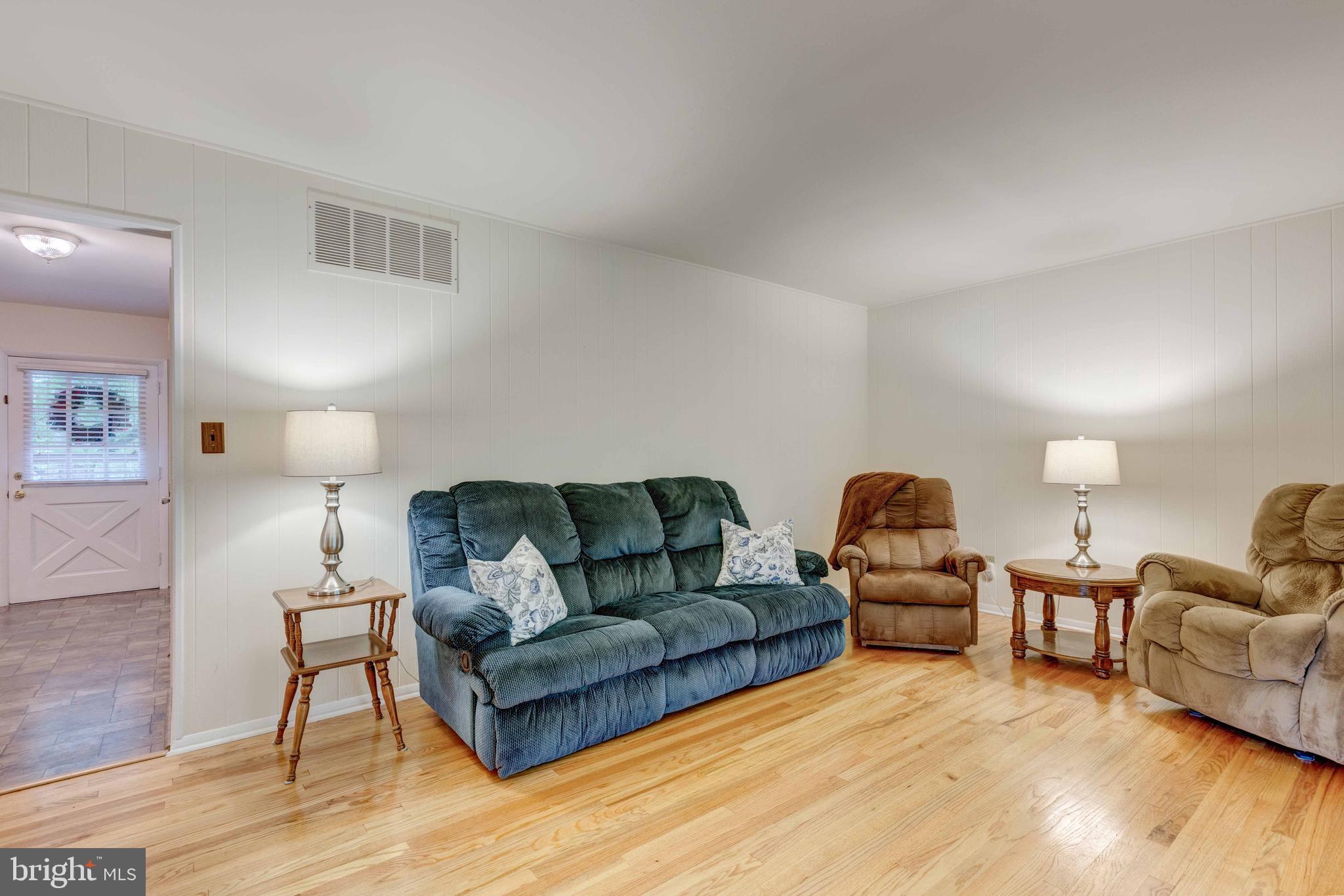 401 Highmeadow Road Reisterstown, MD 21136 - Photo 17 of 36 Family Room with real hardwood floors