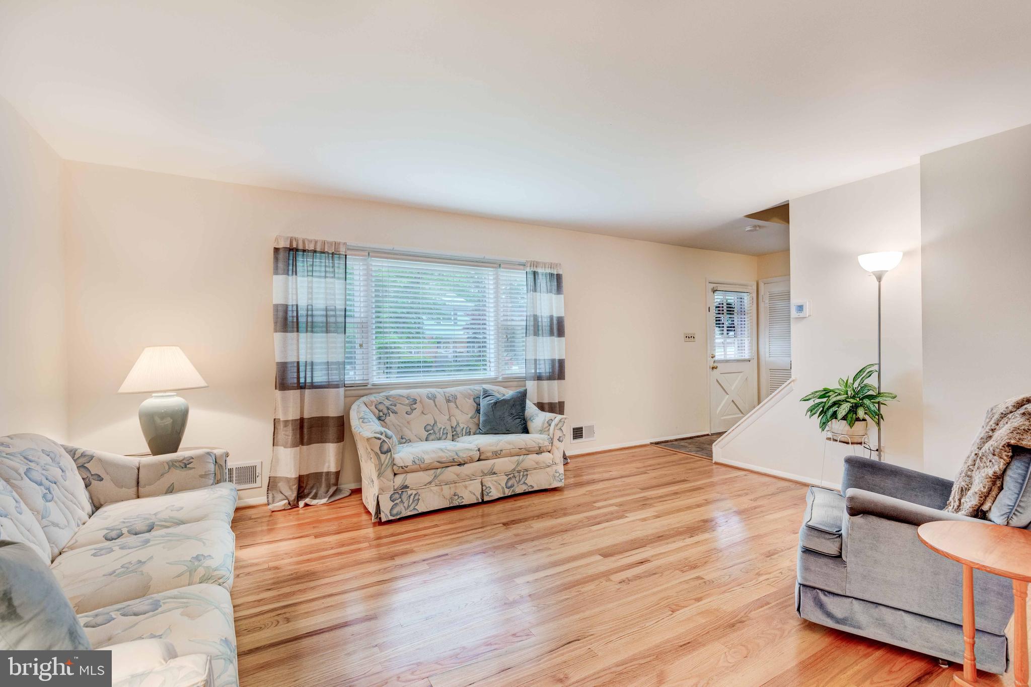 401 Highmeadow Road Reisterstown, MD 21136 - Photo 10 of 36 Living Room with Gleaming Hardwood floors