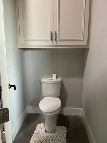 a bathroom with a double vanity sink and mirror