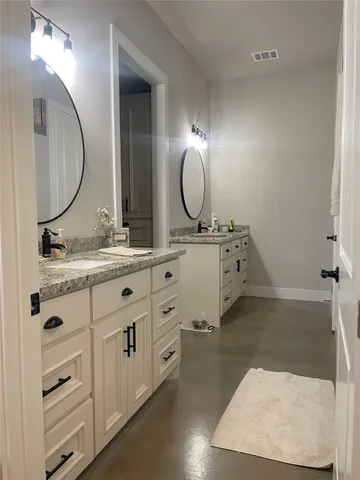 a view of a dining table and chairs in the patio