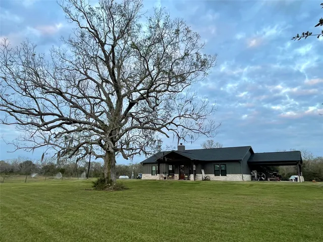 a view of outdoor space with deck and green space