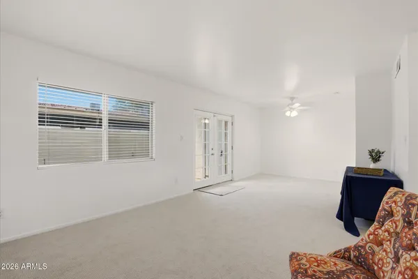 a living room with furniture and window