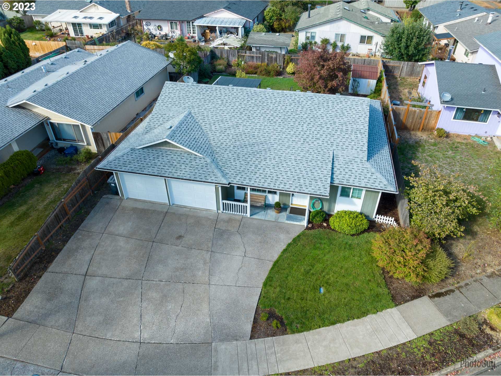 4888 B Street Springfield, OR 97478 - Photo 2 of 32 an aerial view of a house with swimming pool garden and patio