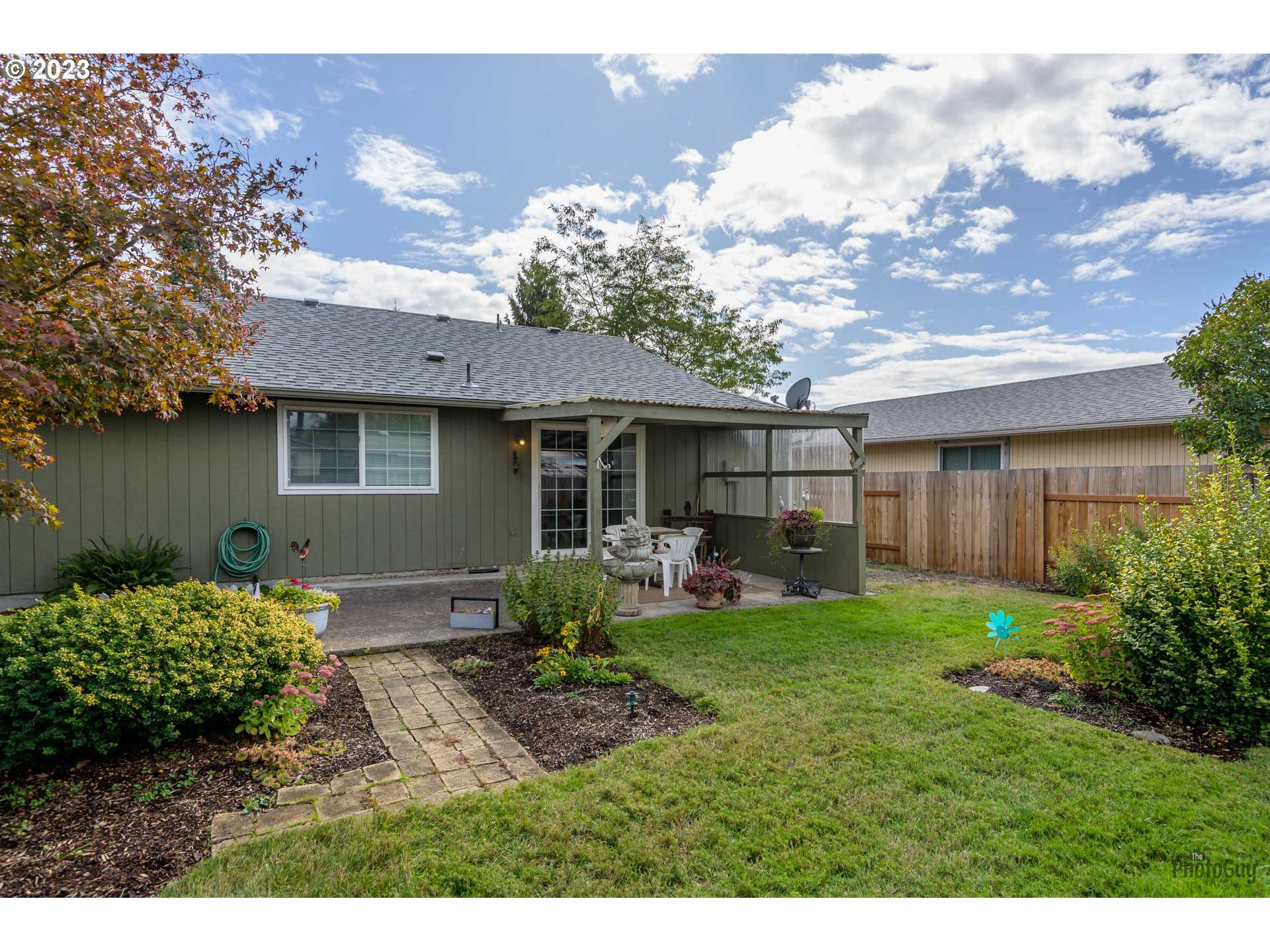 4888 B Street Springfield, OR 97478 - Photo 25 of 32 a view of a house with a yard and sitting area