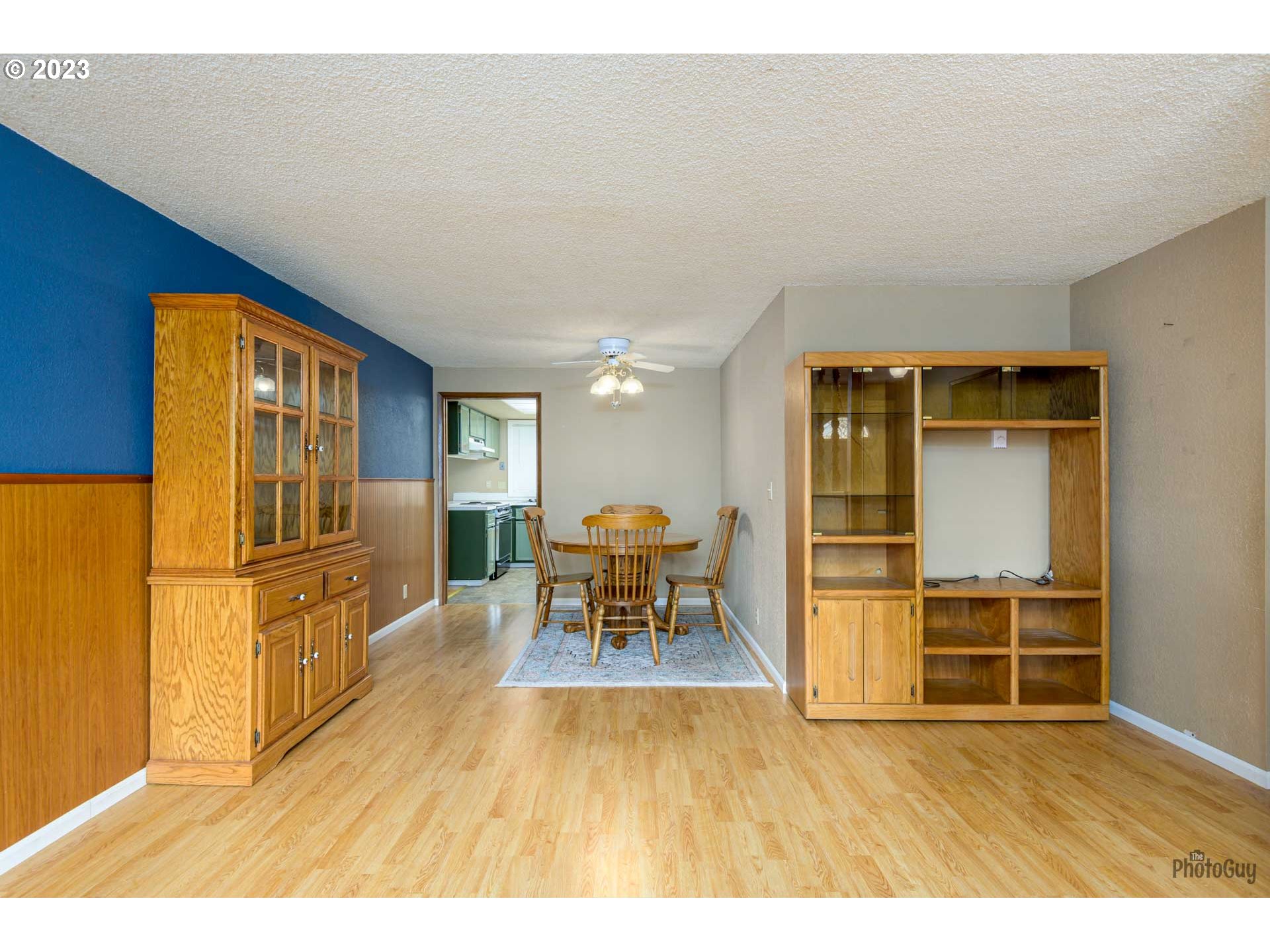 4888 B Street Springfield, OR 97478 - Photo 5 of 32 a living room with stainless steel appliances furniture a refrigerator and kitchen view