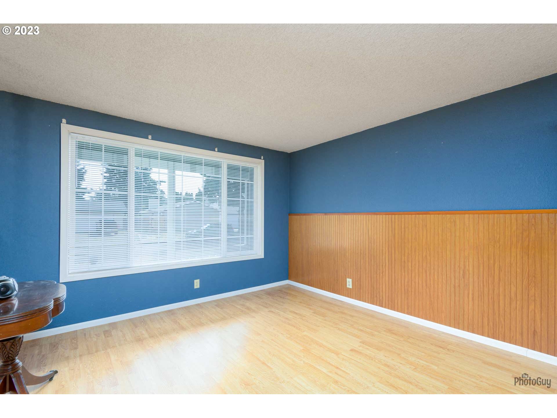 4888 B Street Springfield, OR 97478 - Photo 7 of 32 a view of an empty room with a window
