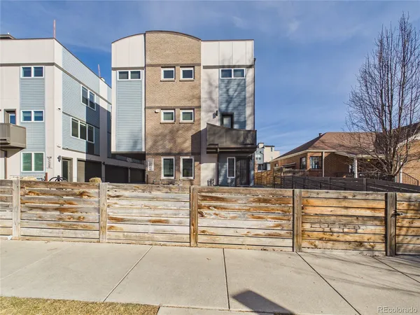 a front view of a building with a street