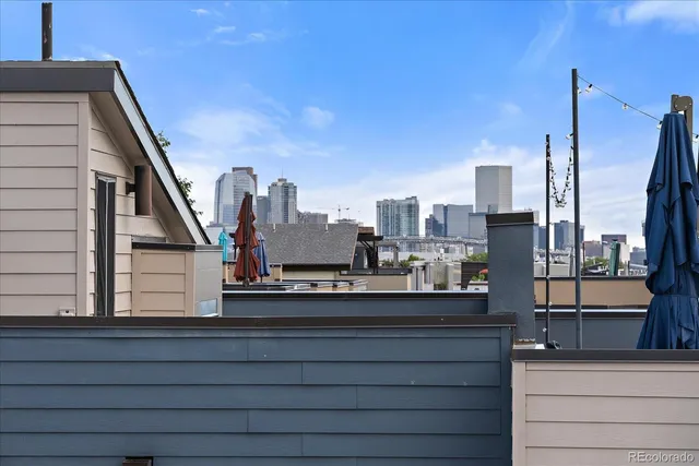 a view of a terrace with a garden and mountain view
