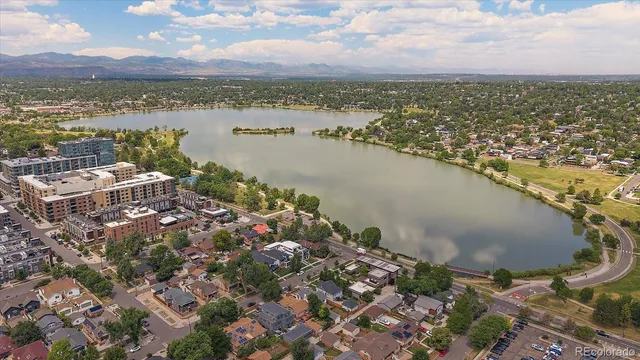 an aerial view of residential building with city view