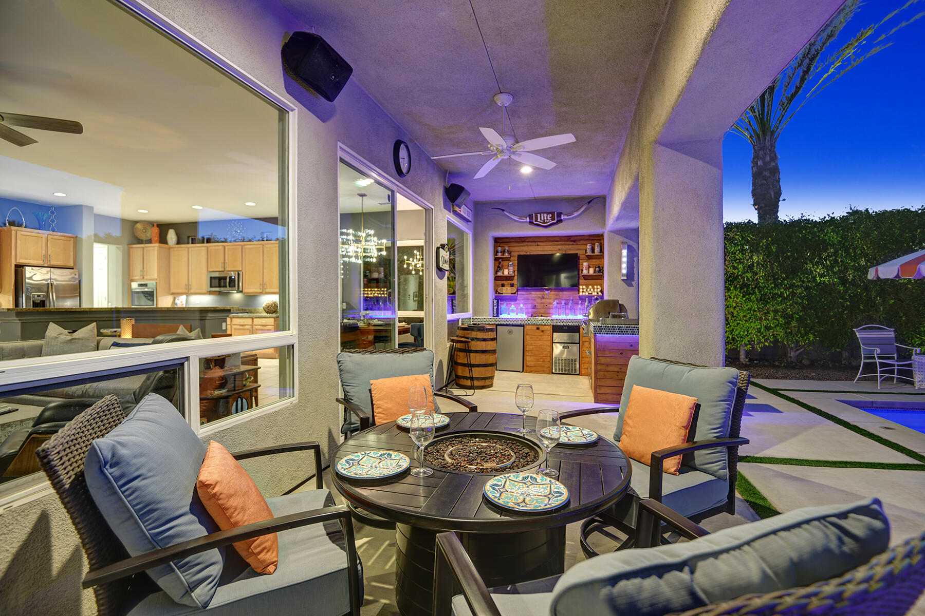69792 Matisse Road Cathedral City, CA 92234 - Photo 10 of 71 BACK COVERED FIRE PIT PATIO TO BAR NIGHT