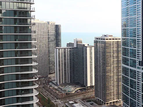 a view of a city with tall buildings