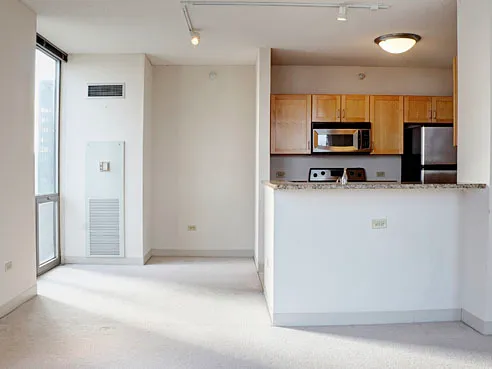 a view of a kitchen with a sink