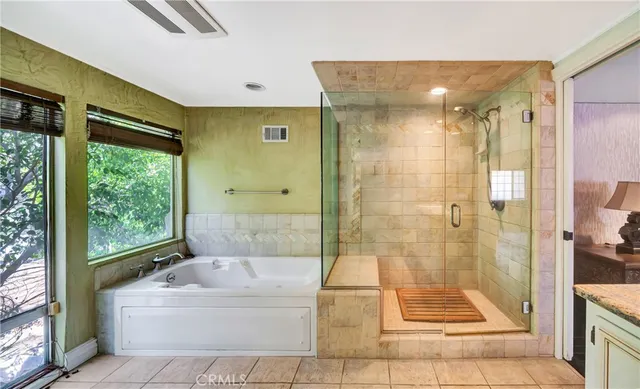 a view of bedroom with furniture and staircase