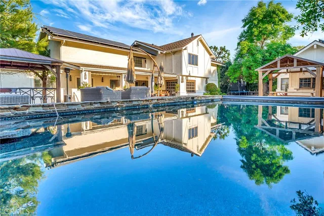 a view of a balcony with chairs