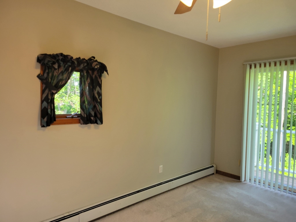 37 Golden Hills Road, Unit 37 Saugus, MA 01906 - Photo 15 of 22 an empty room with windows