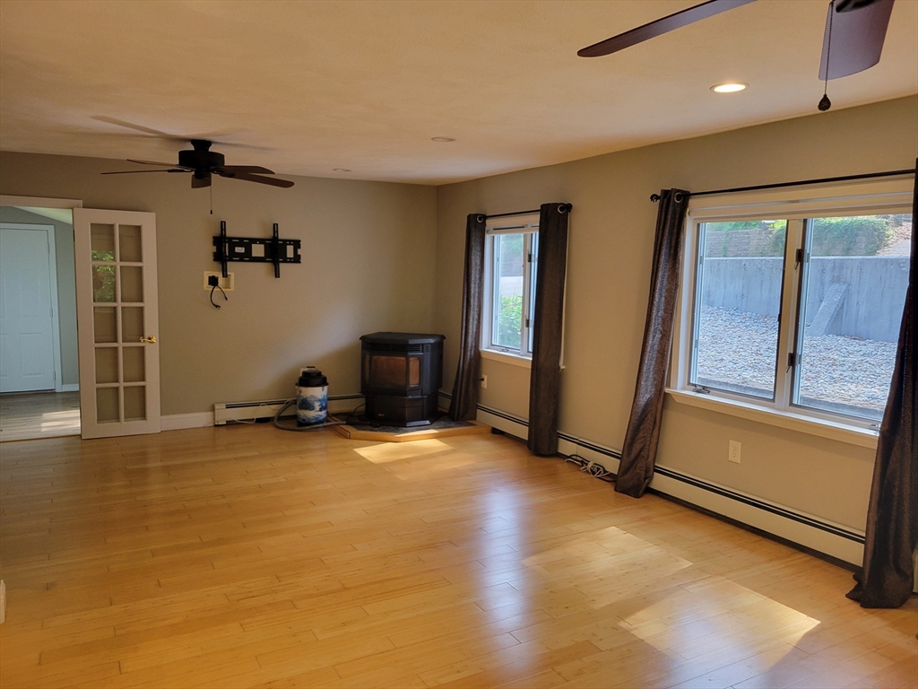 37 Golden Hills Road, Unit 37 Saugus, MA 01906 - Photo 6 of 22 an empty room with windows