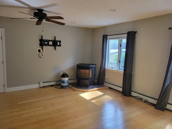 a room with gym equipment and a window