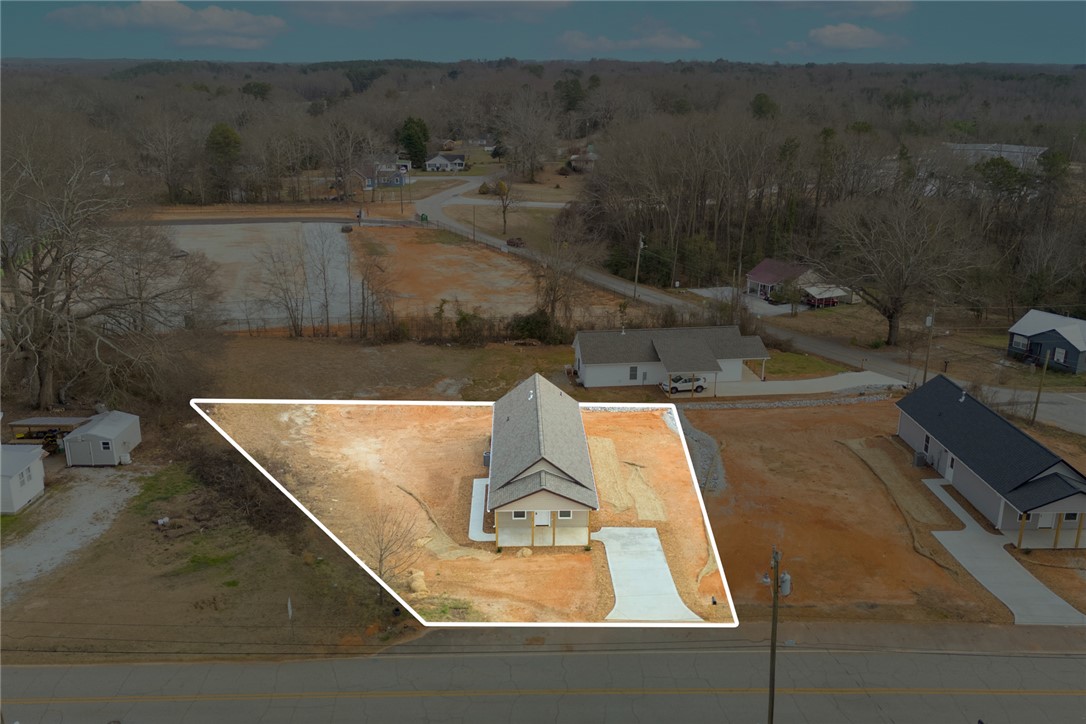 115 Riley Street Westminster, SC 29693 - Photo 36 of 46 This new construction home features a paved driveway and a classic gable roof.