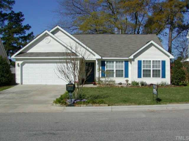 Front view of home with award-winning landscaping. Exterior Front
