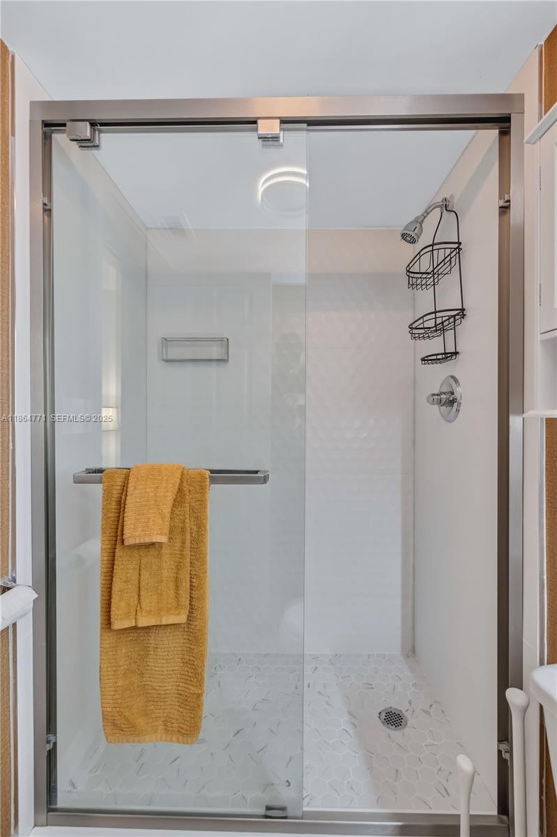 1390 Northeast 150th Street Miami, FL 33161 - Photo 14 of 32 a bathroom with a shower