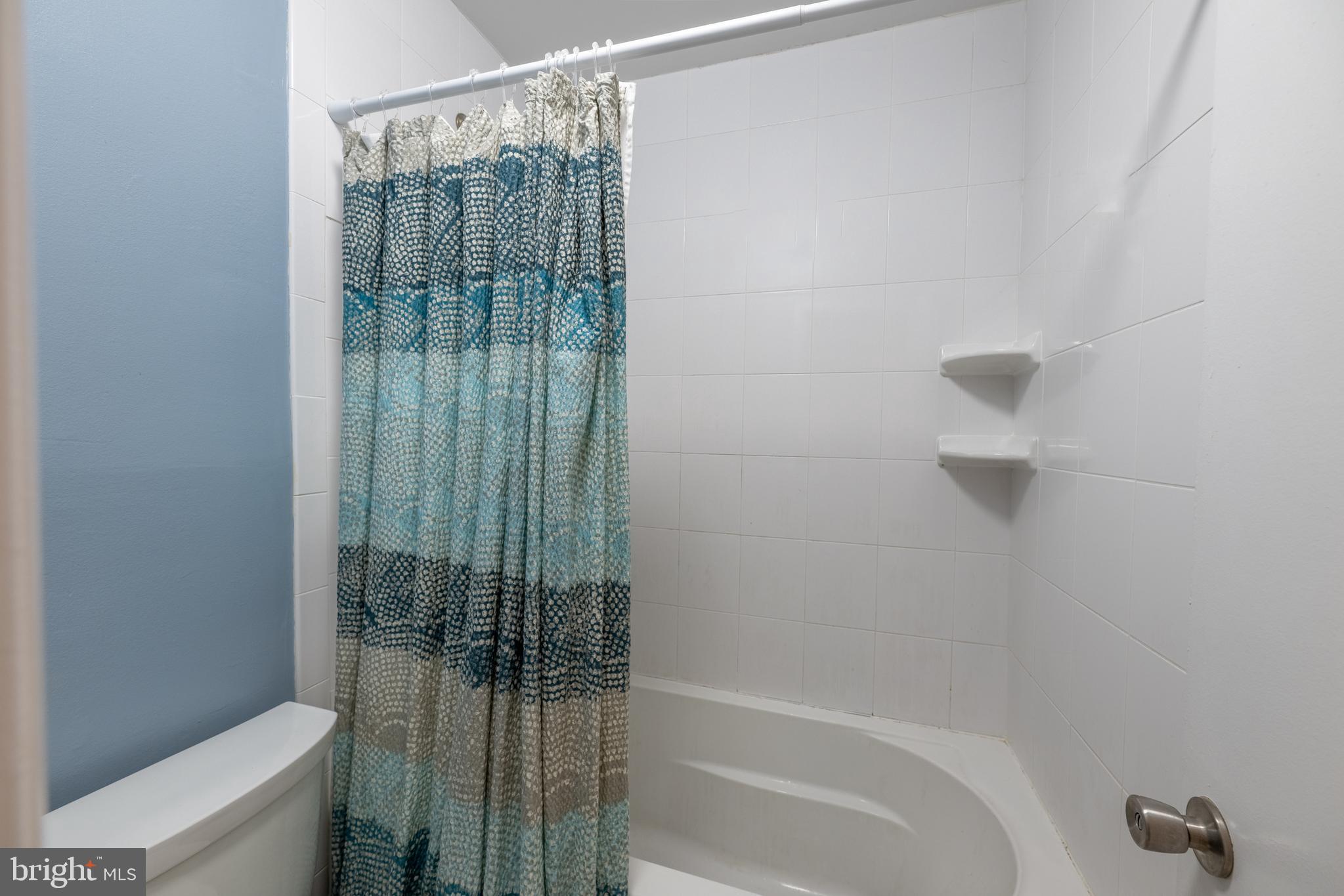 11917 Barrel Cooper Court Reston, VA 20191 - Photo 29 of 59 a bathroom with a shower