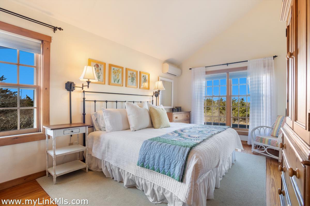 13 Eat Fire Spring Road Nantucket, MA 02554 - Photo 21 of 43 a bedroom with a bed couch and a window