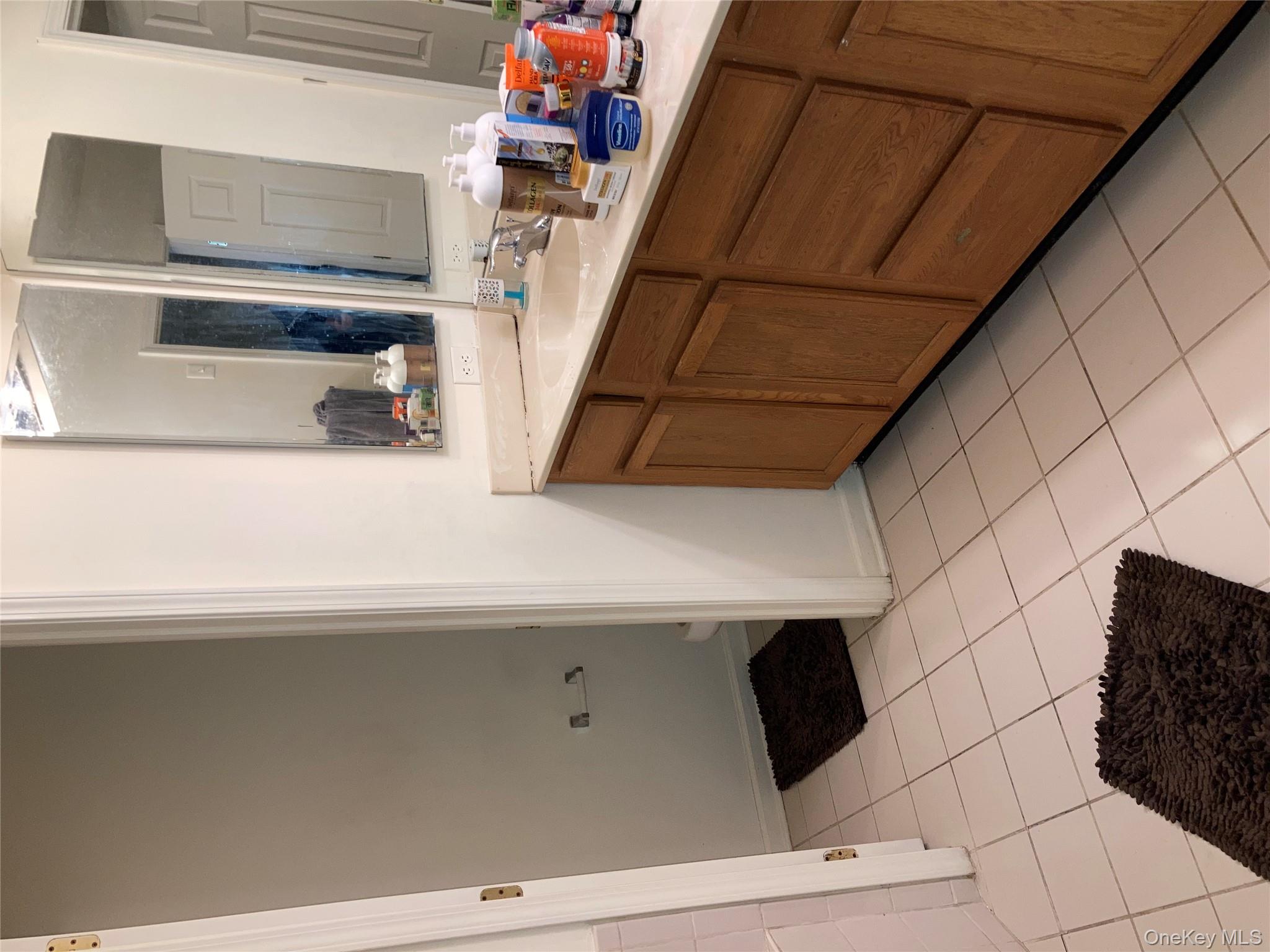 3 Webster Court Monroe, NY 10950 - Photo 11 of 25 a bathroom with a sink a vanity and a mirror