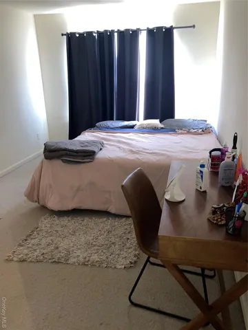 a bathroom with a toilet and a sink