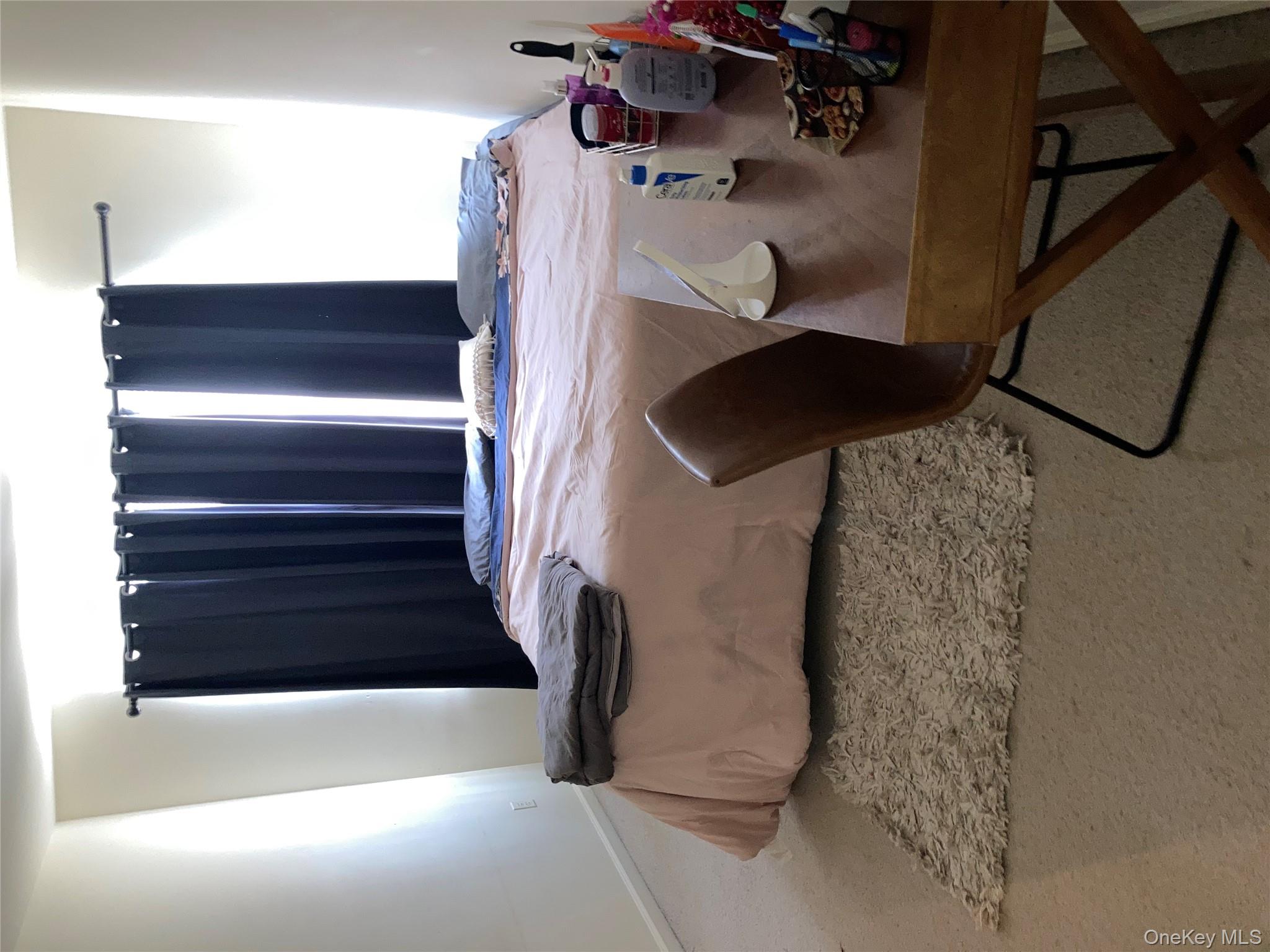 3 Webster Court Monroe, NY 10950 - Photo 18 of 25 a bedroom with a bed and dresser