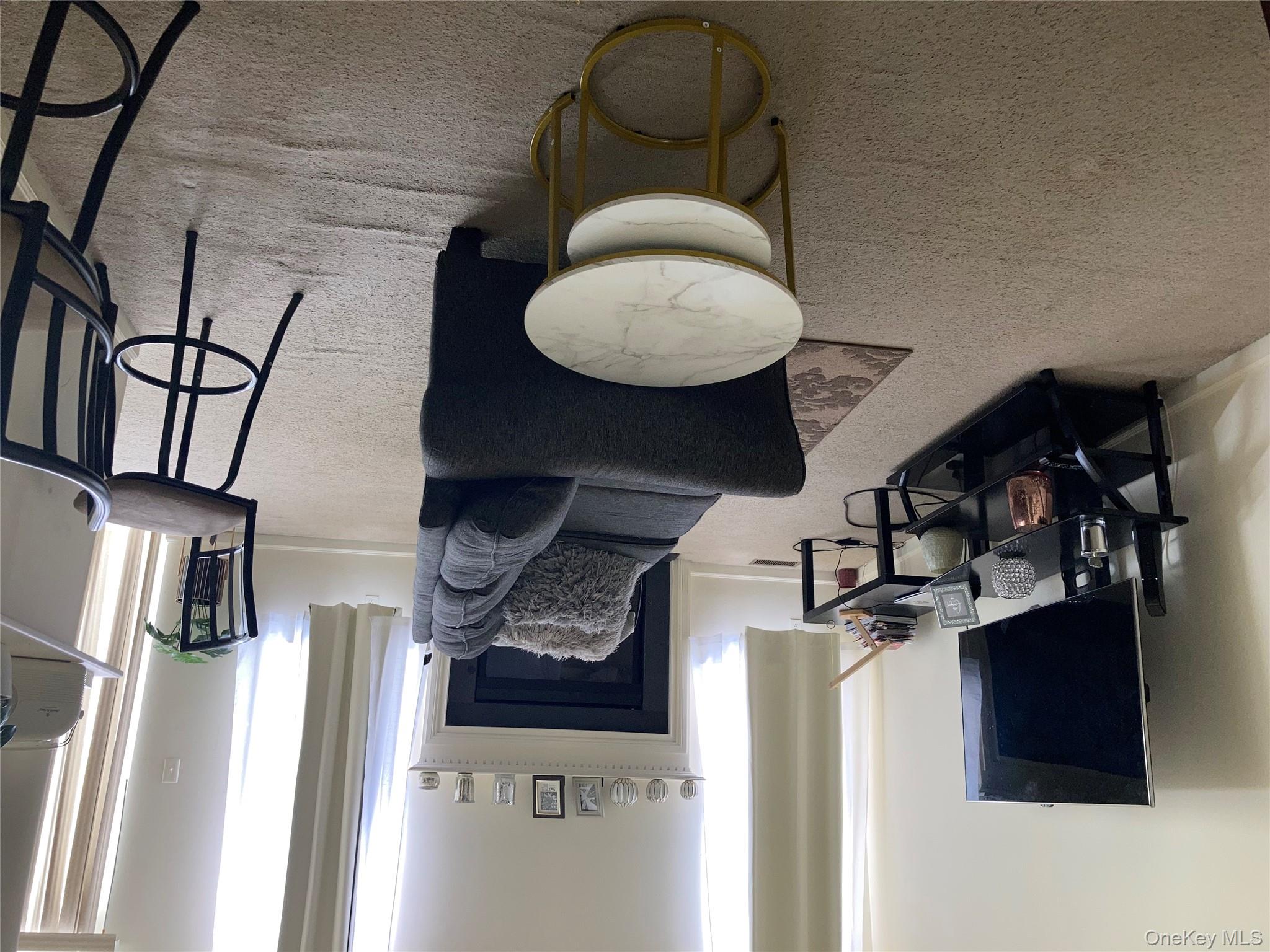 3 Webster Court Monroe, NY 10950 - Photo 6 of 25 a living room with furniture and a fireplace