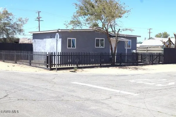 a view of a house with a roof deck