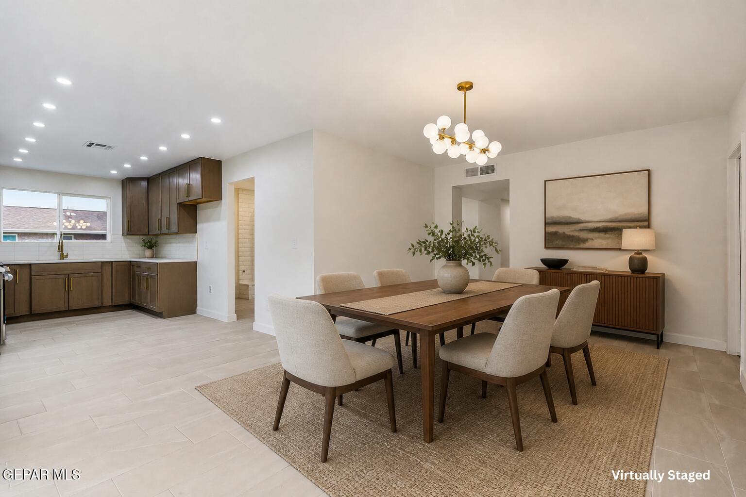 709 Frontera Road El Paso, TX 79922 - Photo 9 of 41 a view of a dining room with furniture