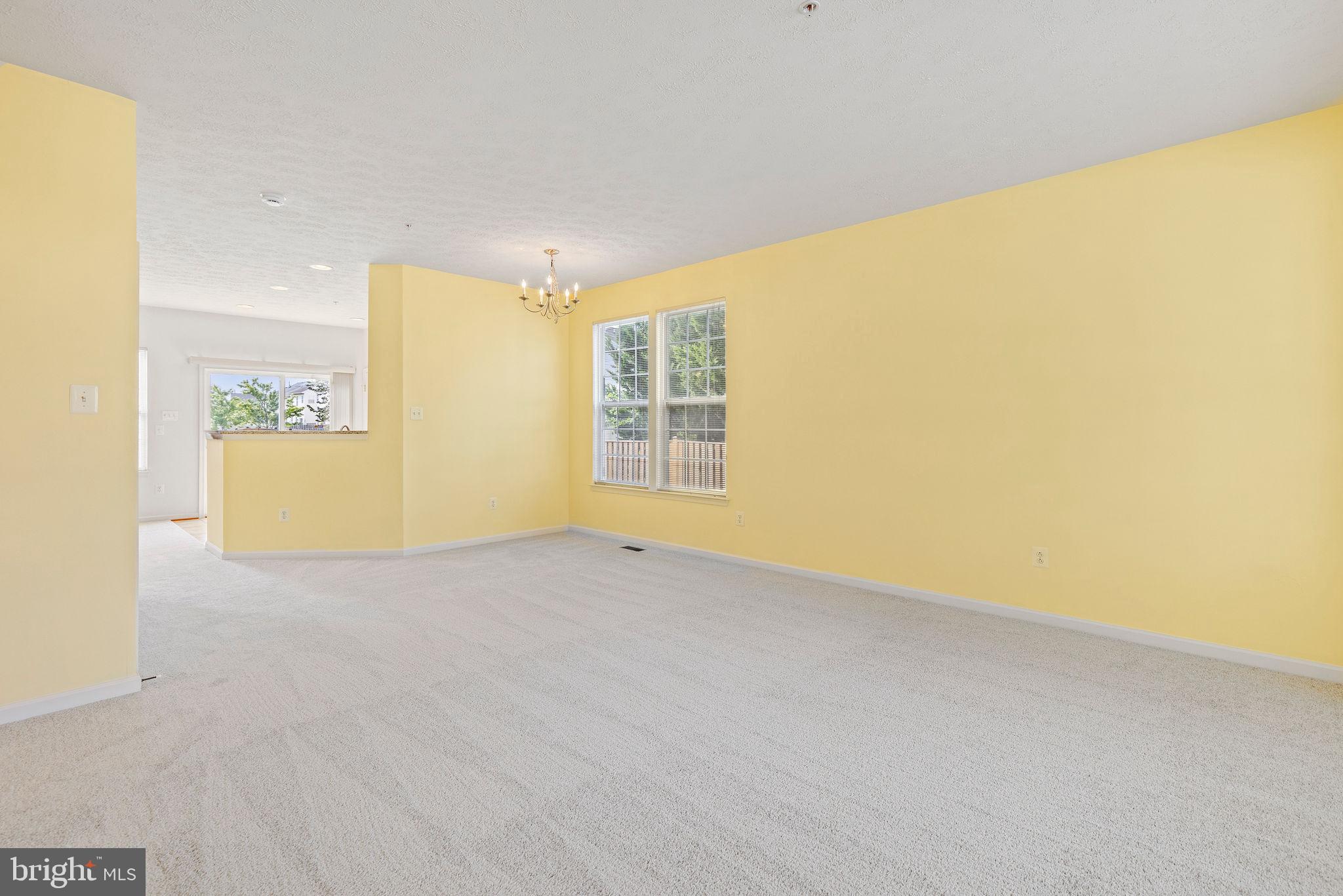 9717 Biggs Road Middle River, MD 21220 - Photo 3 of 48 a view of an empty room with a window