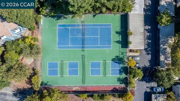 an aerial view of a house with a garden