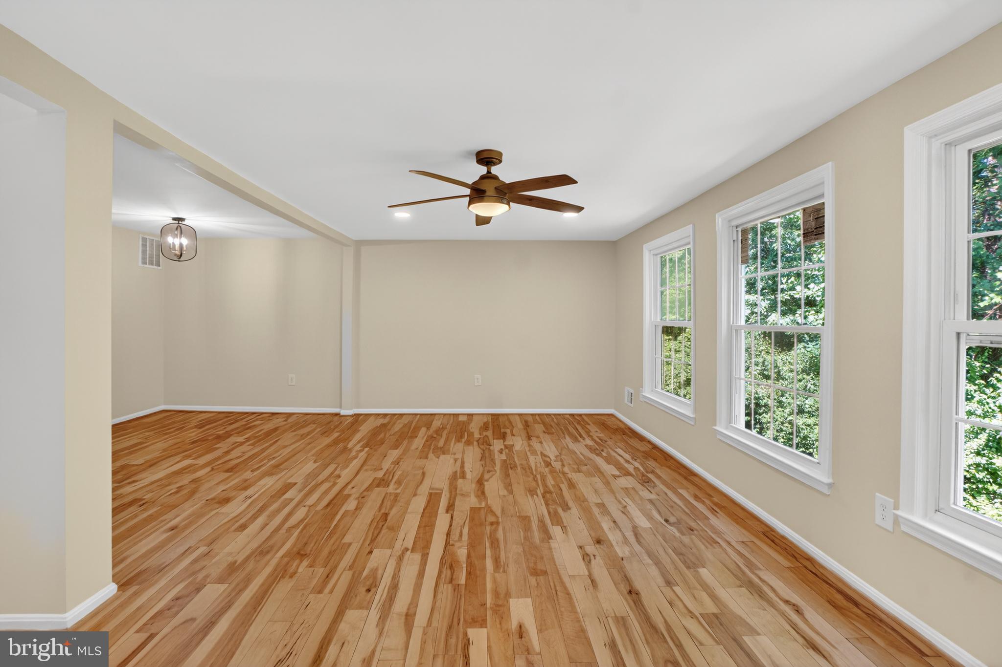 1232 Palmer Road, Unit 111 Fort Washington, MD 20744 - Photo 12 of 45 wooden floor in an empty room with a window