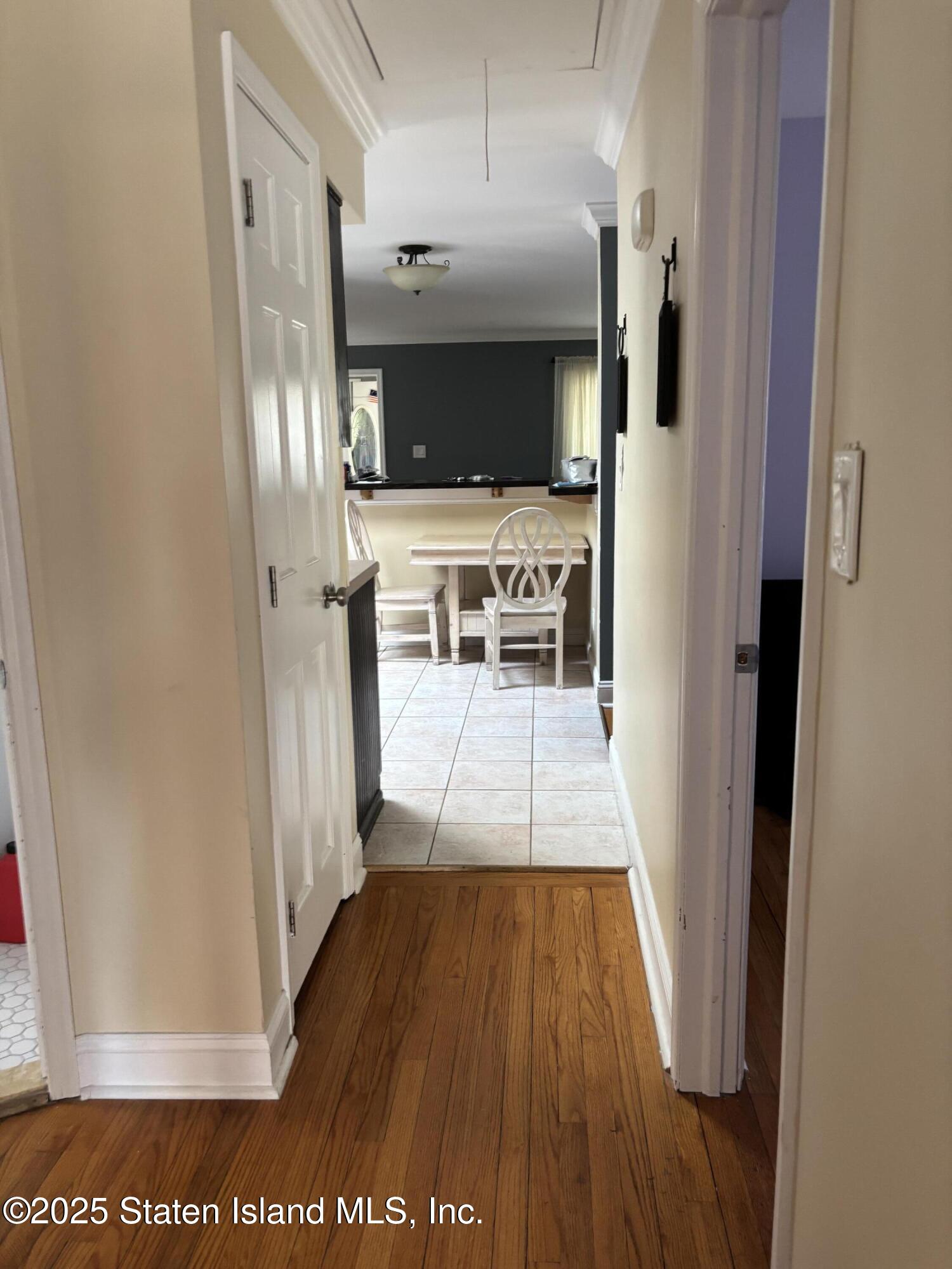 16 Ridgecrest Avenue Staten Island, NY 10312 - Photo 11 of 20 a view of a living room with a wooden floor