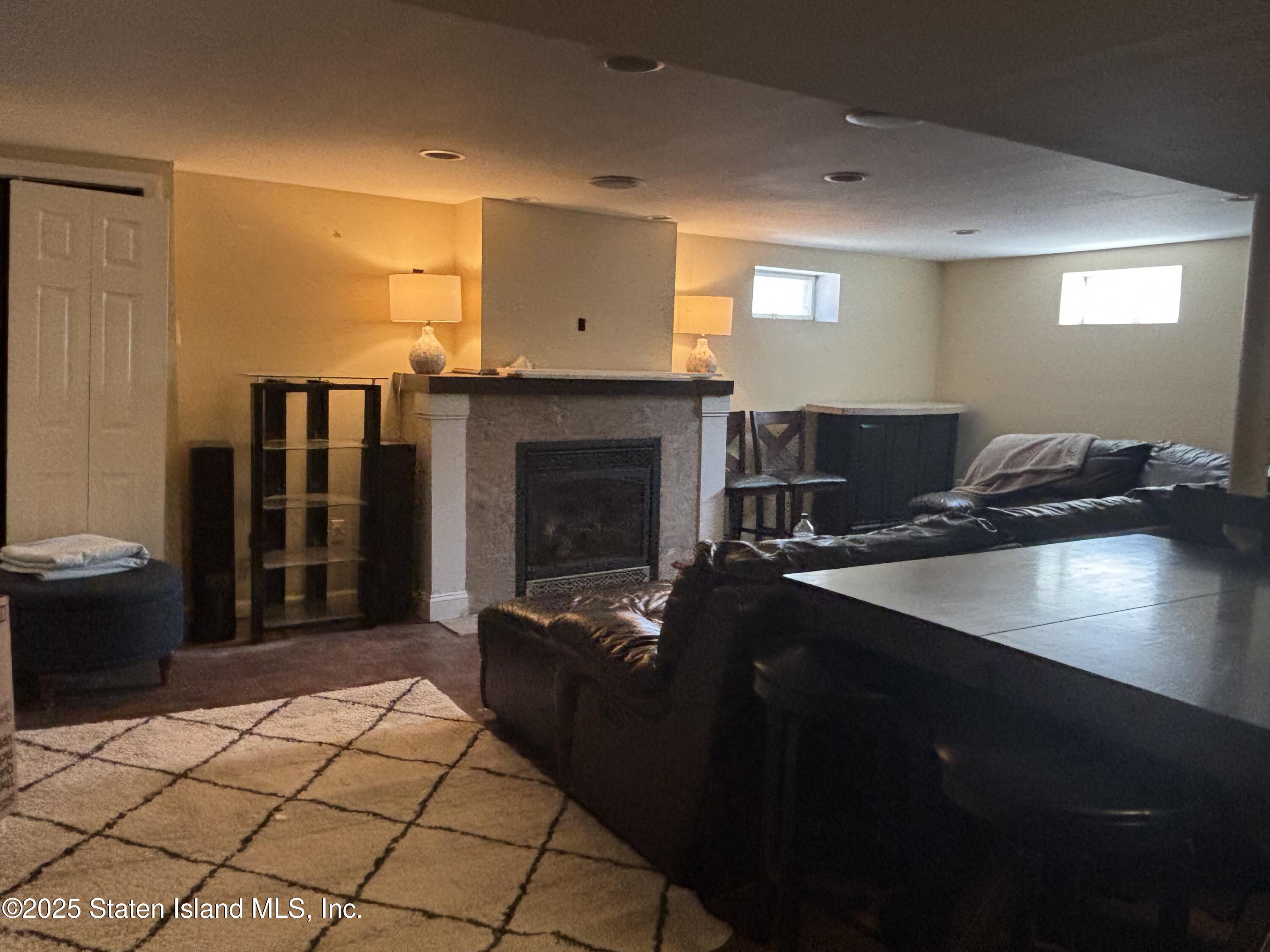 16 Ridgecrest Avenue Staten Island, NY 10312 - Photo 15 of 20 a kitchen with a sink and a stove top oven
