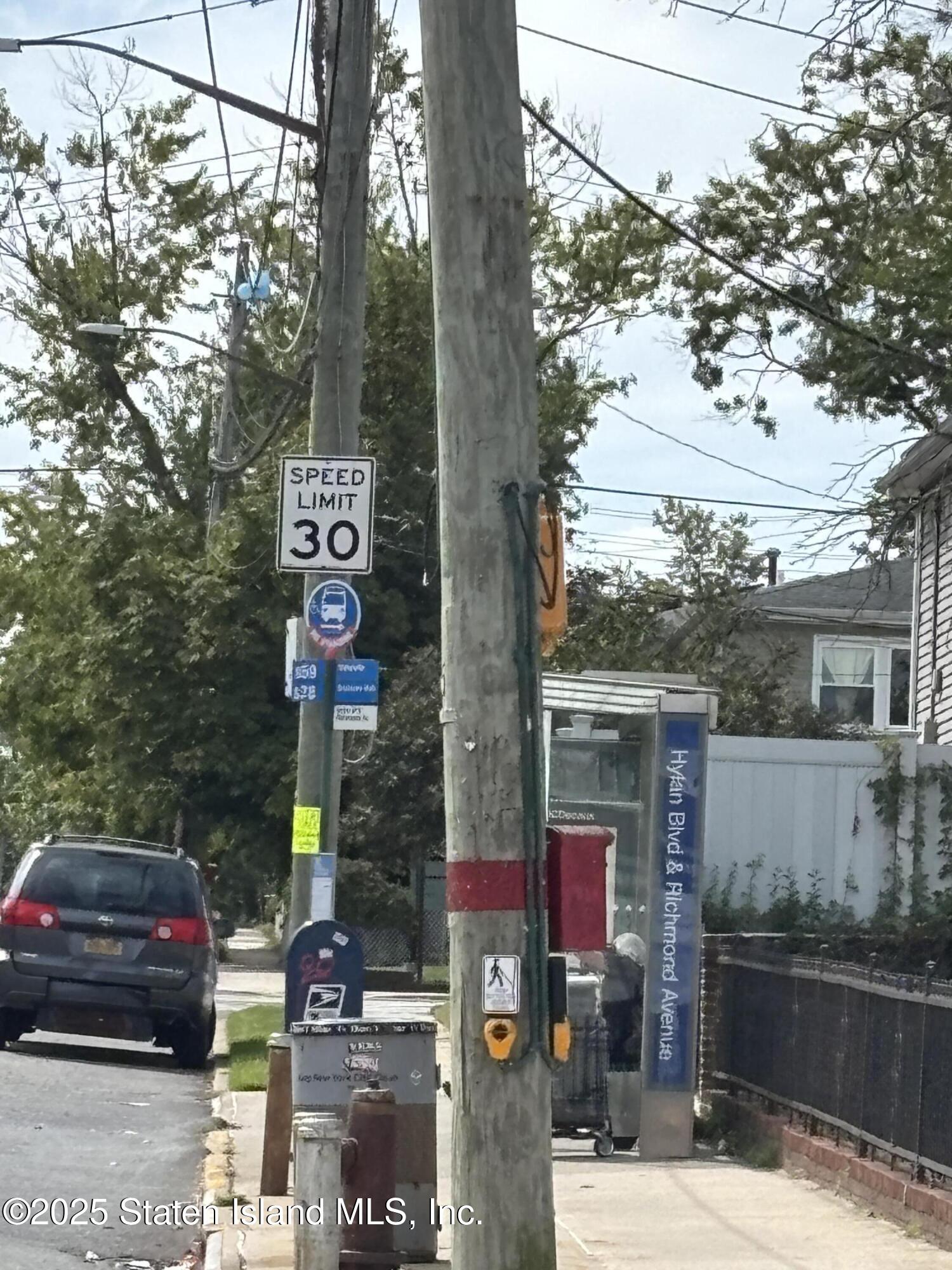 16 Ridgecrest Avenue Staten Island, NY 10312 - Photo 20 of 20 a front view of a building with trees