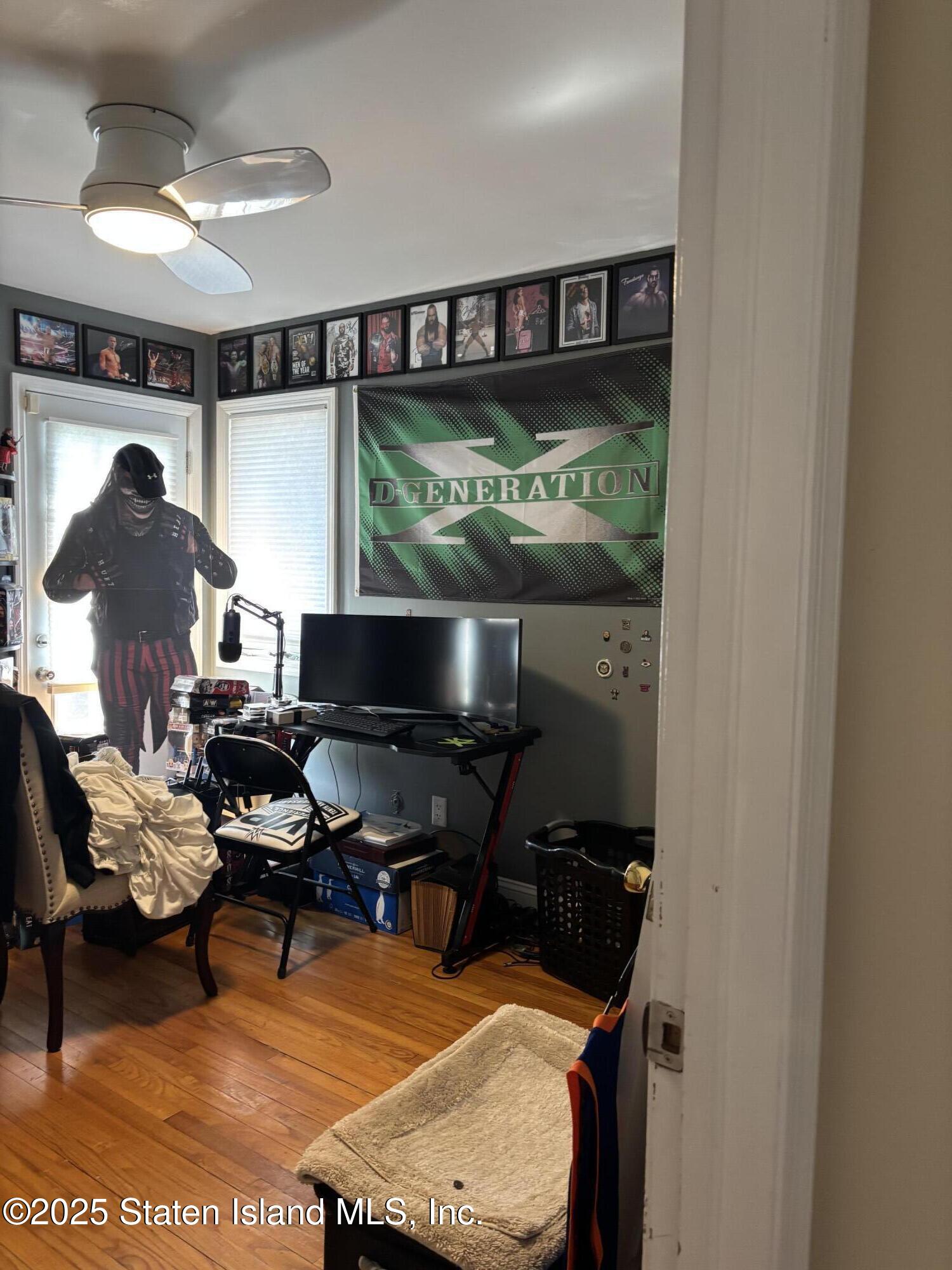 16 Ridgecrest Avenue Staten Island, NY 10312 - Photo 10 of 20 a room with furniture and a large window